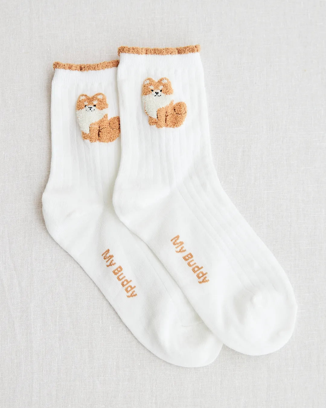socks white brown dog