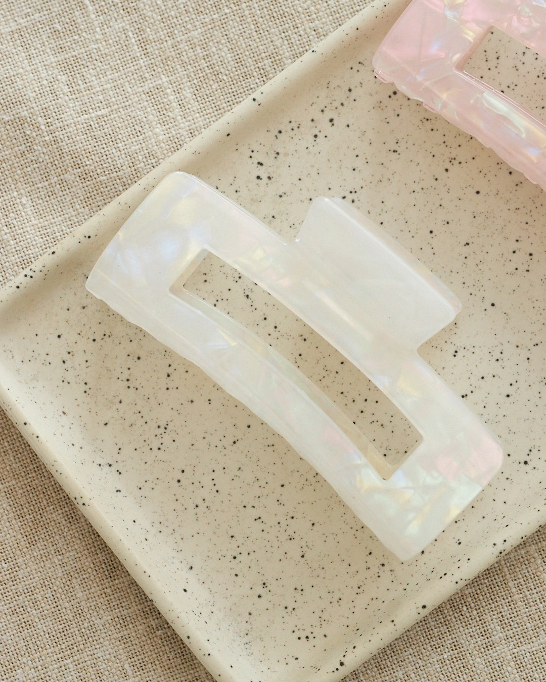 white rectangular glossy hair clip