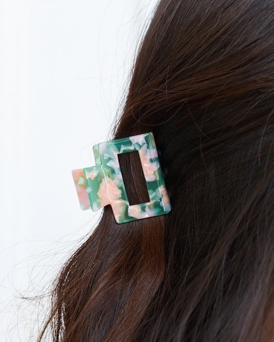 green and pink hair clip