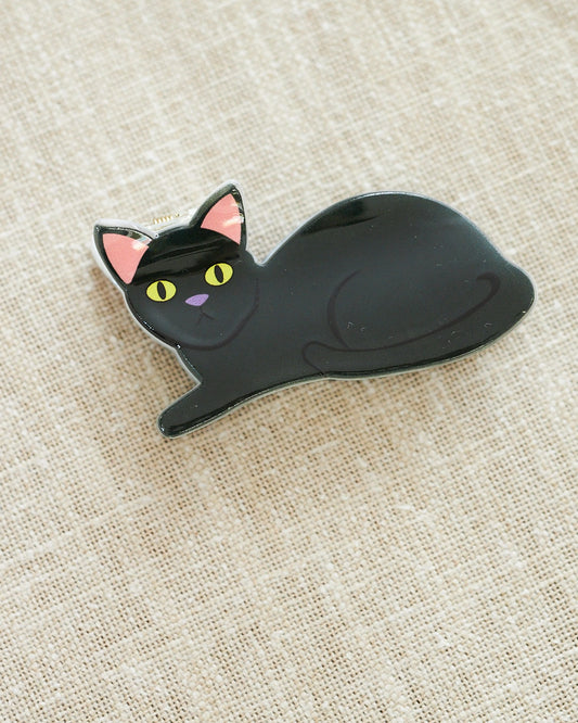 sleek black cat hair clip