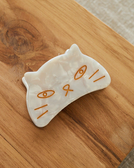 white cat hair clip