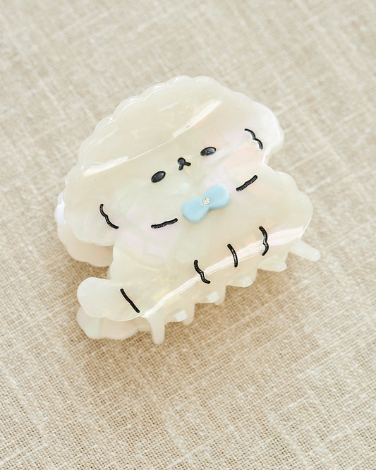 white dog hair clip